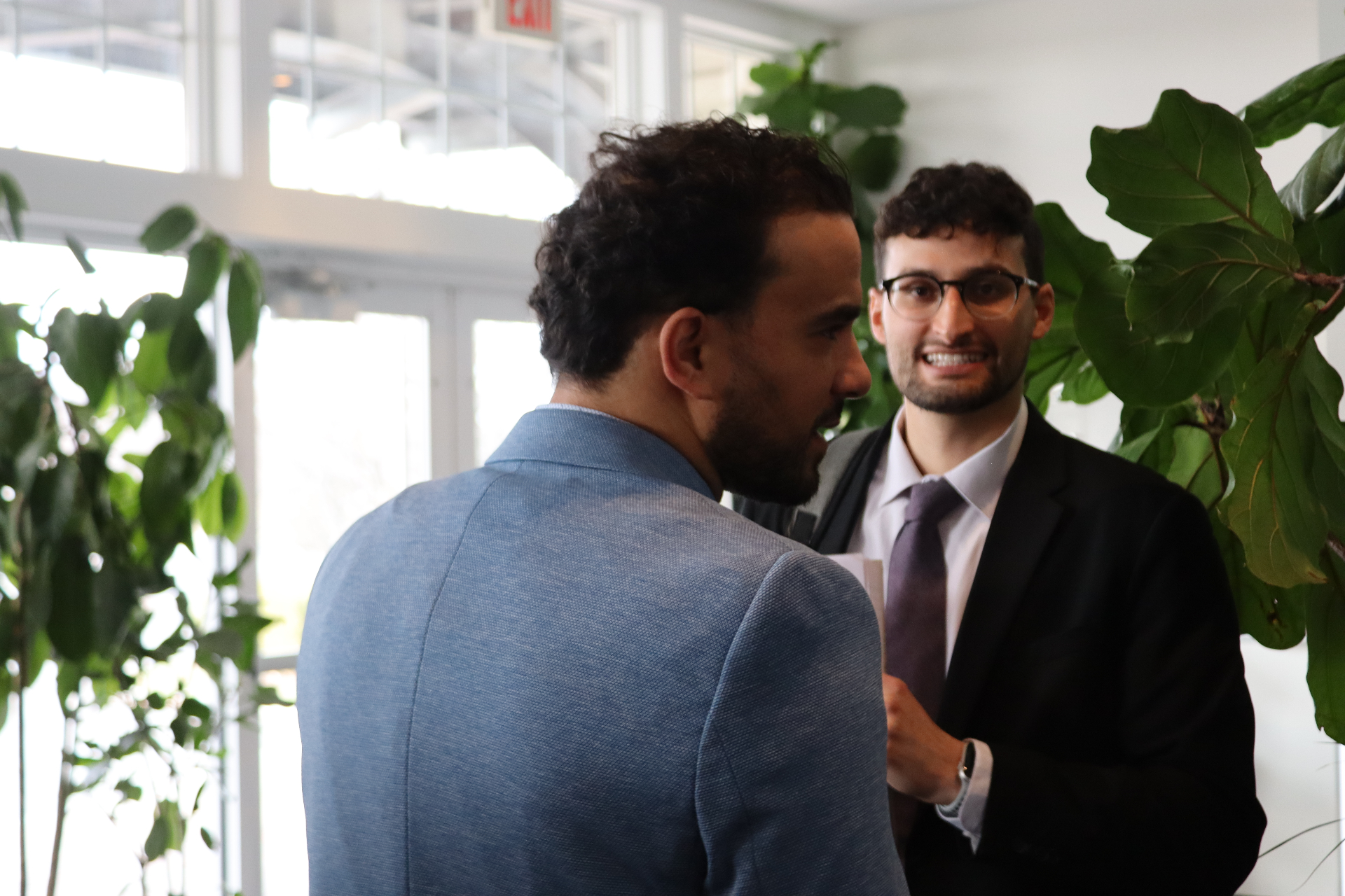 Two Cornerstone team members talking through a campaign together